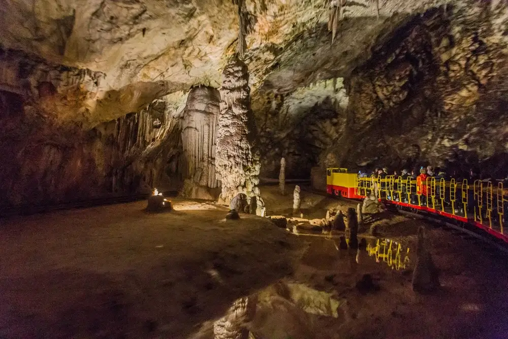 Take a train ride into the caves at Postojna