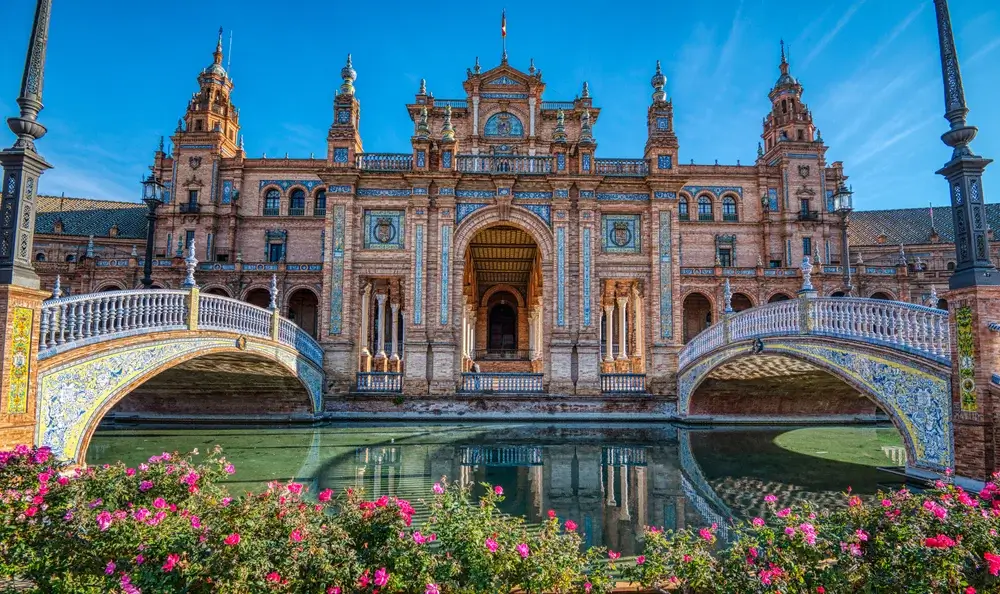 Visit Plaza de España – one of the most famous landmarks in Seville.