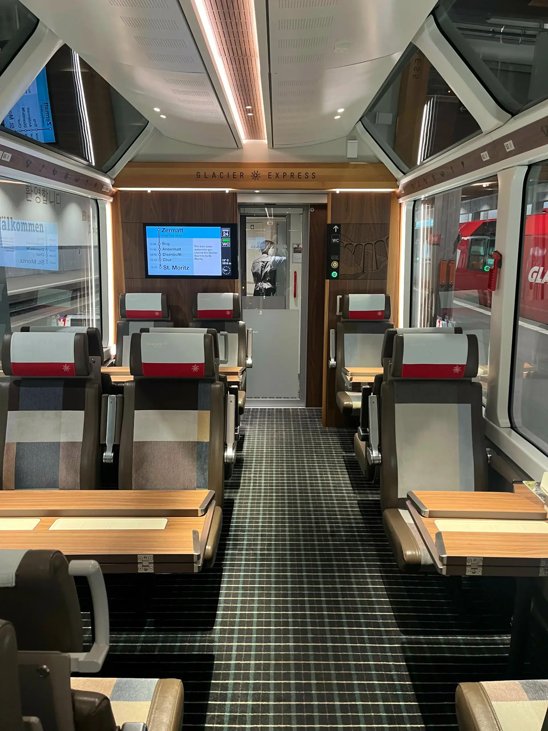 First class in Glacier Express with panoramic windows and comfortable seating in Zermatt